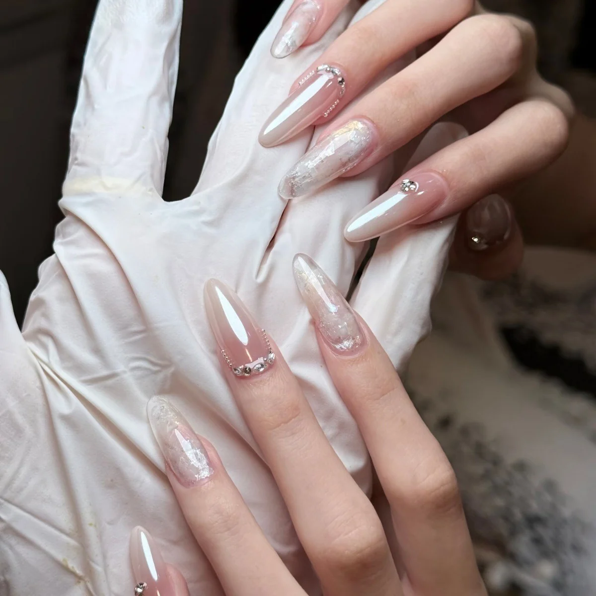 Chrome Acetate Glam (DN-13) molten silver almond press-on nails, view 2